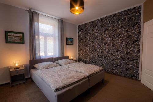 Postel nebo postele na pokoji v ubytování Villa Waldlust - 5 Sterne - 2 Schlafzimmer