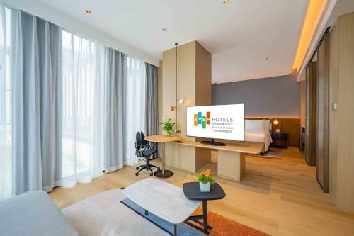 Μια τηλεόραση ή/και κέντρο ψυχαγωγίας στο EVEN Hotels Shanghai Expo by IHG