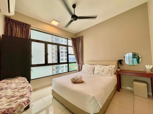 a bedroom with a bed and a large window at Citywoods 2B2BR - JB Town near HSA, CIQ, Mall - WiFi in Johor Bahru