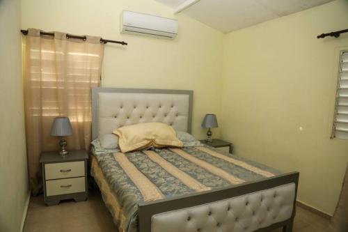 Ένα ή περισσότερα κρεβάτια σε δωμάτιο στο Villa Rocio - Country Villa with pool