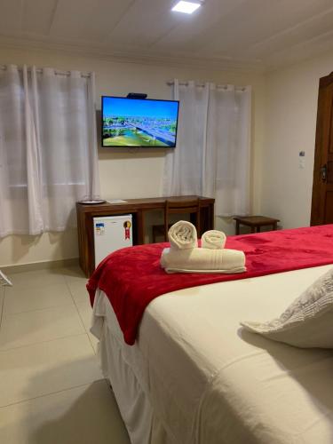 Letto o letti in una camera di Pousada Antígona