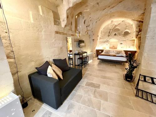 a living room with a couch and a table at CASA VACANZE BB 164-166 in Matera