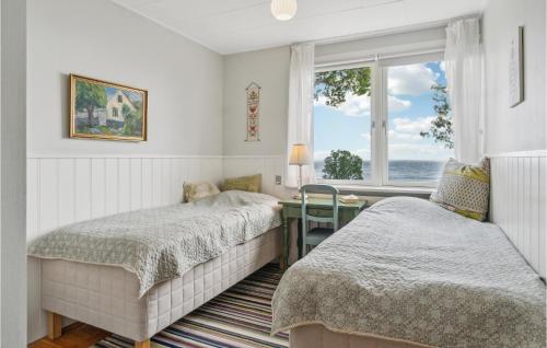 Krevet ili kreveti u jedinici u okviru objekta Awesome Apartment In Svaneke With House Sea View
