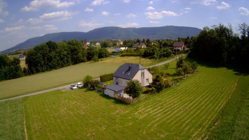 an aerial view of a house in a field at Apartamenty Happy & Relax in Bielsko-Biała