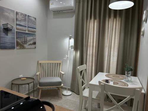 Гостиная зона в Armonía Small Luxury Apartments