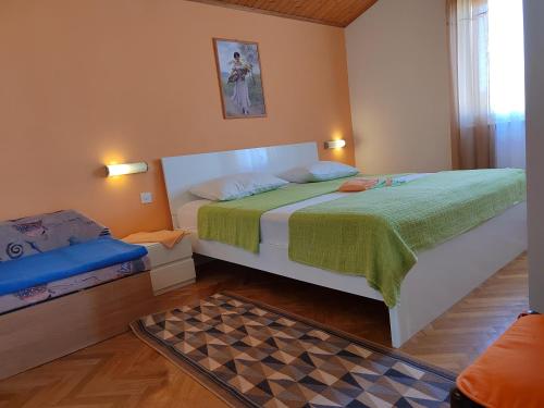 Postel nebo postele na pokoji v ubytování Apartments Silmare