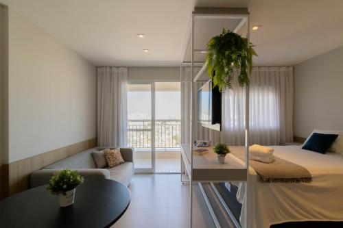 Ένα ή περισσότερα κρεβάτια σε δωμάτιο στο Avenue Studio - GRU 2207