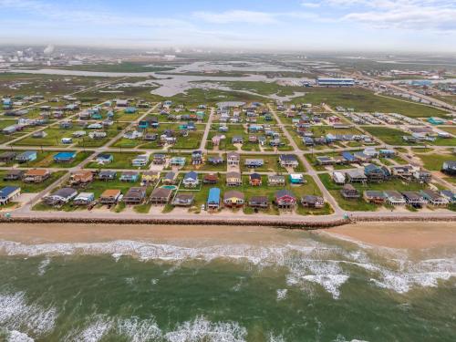 an aerial view of a parking lot at the beach at Oceanfront 4BR, Peaceful, Cozy, Kids/Pet Friendly! in Freeport