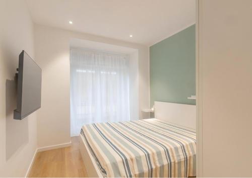 מיטה או מיטות בחדר ב-Appartamento Amalfi