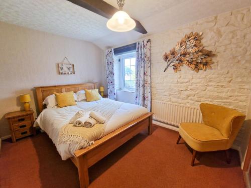 Postel nebo postele na pokoji v ubytování Mickledale at Wetheral Cottages