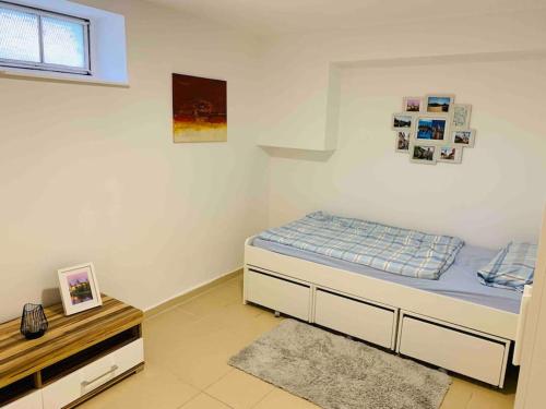 Posteľ alebo postele v izbe v ubytovaní Souterrain budget accomodation