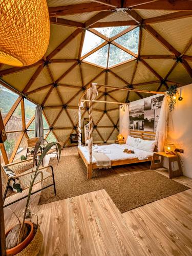 a bedroom in a yurt with a bed in it at Serenity Dome Sapanca in Sapanca