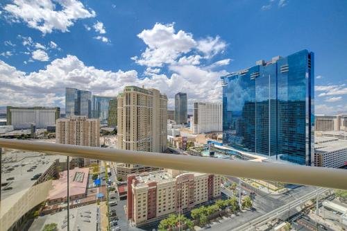 a view of a city skyline with tall buildings at Premium Suite MGM Signature HIGH FLR Balcony Strip View in Las Vegas