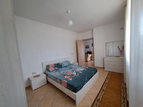 Llit o llits en una habitació de Beach view Apartment