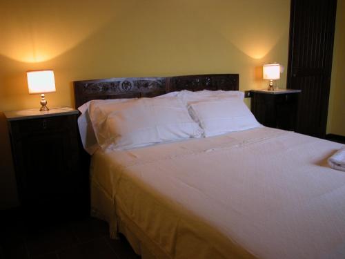 Posteľ alebo postele v izbe v ubytovaní Agriturismo Casa Garello