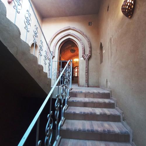 a set of stairs in a building with a hallway at Mystical habou domes villa private pool in Luxor