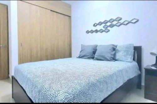 Postel nebo postele na pokoji v ubytování 404 apart 2hab Aire Central - piscina y ascensor