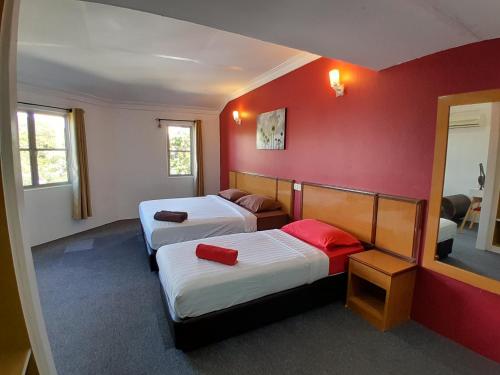 Katil atau katil-katil dalam bilik di THE ZULEY HERITAGE HOTEL