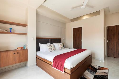 Un pat sau paturi într-o cameră la Bardia’s homestay