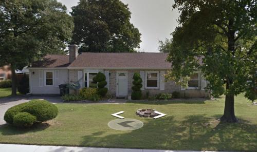 a house with a number on the lawn at Cooper in Fort Washington