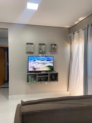 TV a/nebo společenská místnost v ubytování Penhasco Residences