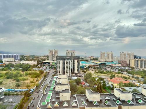 an aerial view of a city with buildings and cars at ЖК «Комфорт Сити» in Almaty