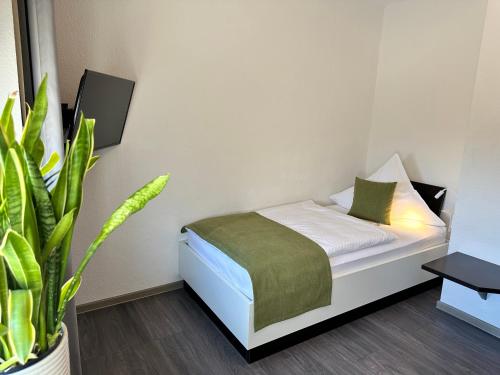 Postel nebo postele na pokoji v ubytování an Hotel