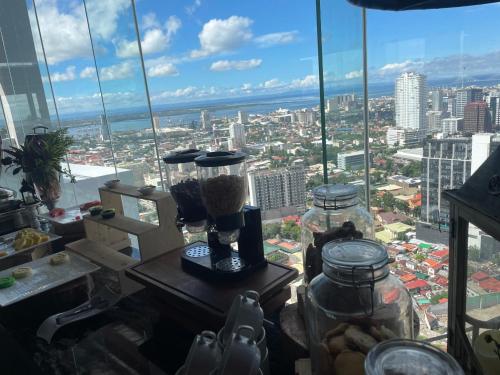 a view of a city from the top of a skyscraper at Condo near Ayala Cebu City w Wifi Balcony in Cebu City