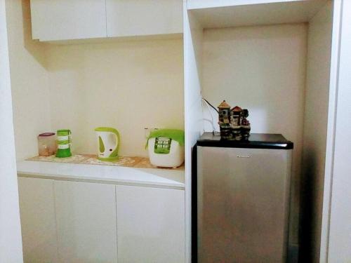 Dapur atau dapur kecil di Cozy Apartment 2