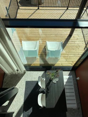 an overhead view of two toilets in a building at Villa Kivi in Valkeakoski