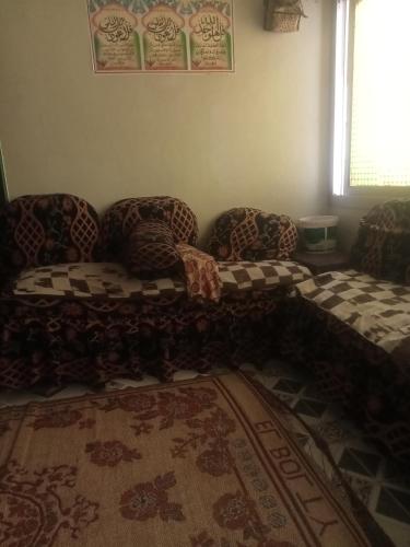 A bed or beds in a room at الخصوص القليوبيةمصر