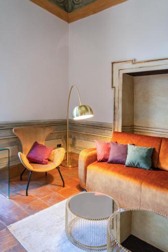 a living room with a couch and a table at Castello di Limatola in Limatola