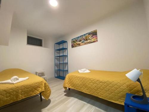 Postel nebo postele na pokoji v ubytování Setubal Holiday