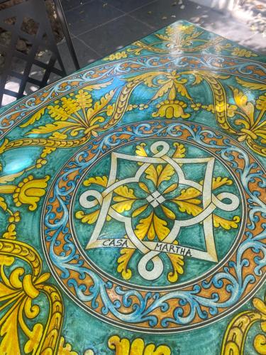 a table top with a colorful design on it at Casa Martha in Stromboli