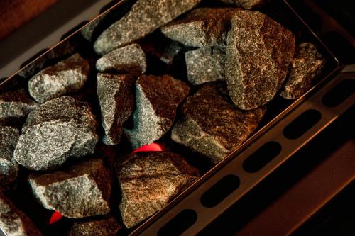 a tray full of rocks in a box at Suites Lorodellago Como - The House Of Travelers in Como