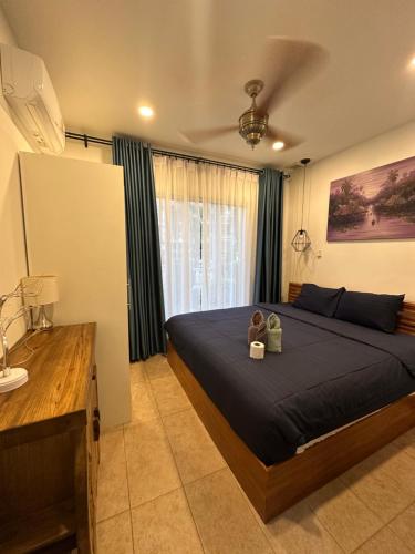 Postel nebo postele na pokoji v ubytování Wannashan pool villa