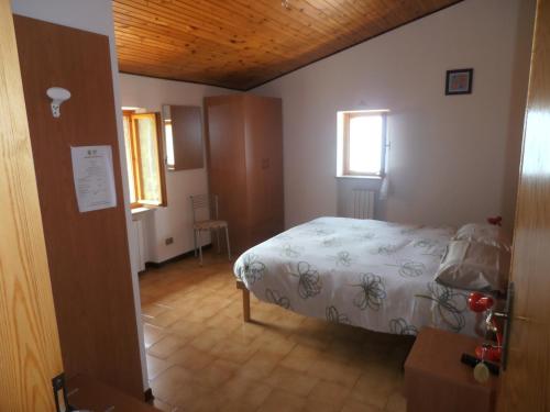 Voodi või voodid majutusasutuse Agriturismo La Part toas