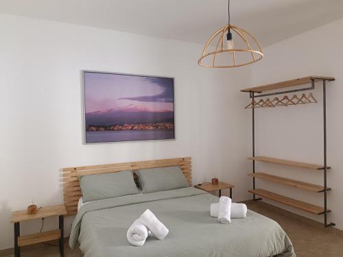 Postel nebo postele na pokoji v ubytování Casa Mimma