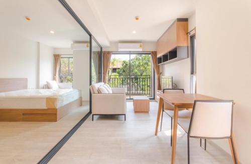 Ένα ή περισσότερα κρεβάτια σε δωμάτιο στο La Casita, Hua Hin, 5 min Condo from the beach