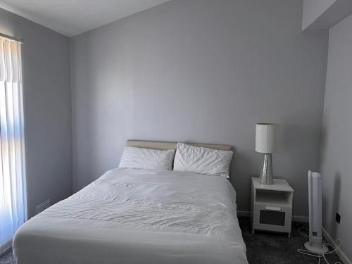 Cama o camas de una habitación en Spacious and comfy