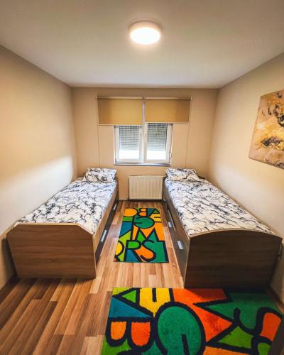Postel nebo postele na pokoji v ubytování Don_house