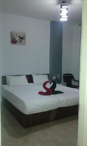 Postel nebo postele na pokoji v ubytování Jordan River Hotel