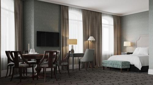 Un ou plusieurs lits dans un hébergement de l'établissement Hotel Victoria