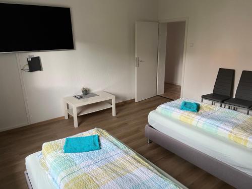 Кровать или кровати в номере Esslingen am Neckar Weilstr.47