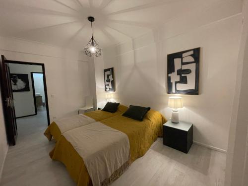 Postel nebo postele na pokoji v ubytování Cascais MHouse lease Alto Castelhana