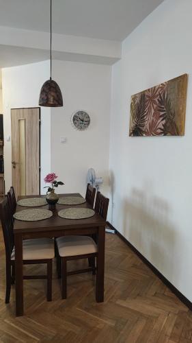a dining room with a table and chairs at Hotel Slávie in Trhová Kamenice
