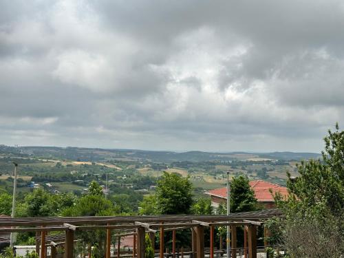a view of the countryside from the roof of a house at Stone house apart hotel in Arnavutköy