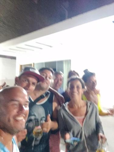 a group of people posing for a picture at Excelente departamento frente al mar. in San Bartolo