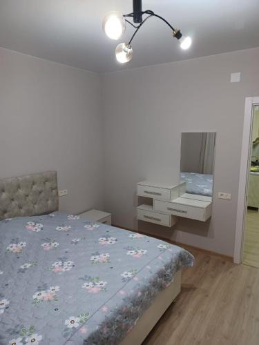 Postel nebo postele na pokoji v ubytování IR Guest House