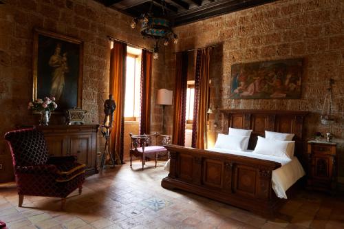 Postel nebo postele na pokoji v ubytování Palazzo storico Colesanti